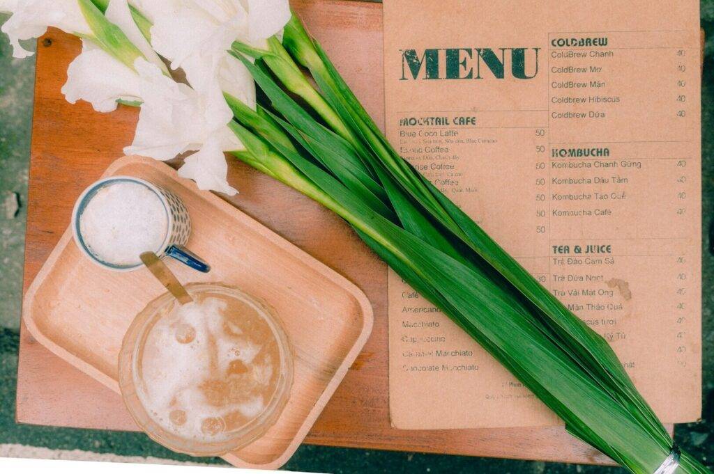 Coffee shop menu featuring various coffee options, highlighting local specialties and beverages.