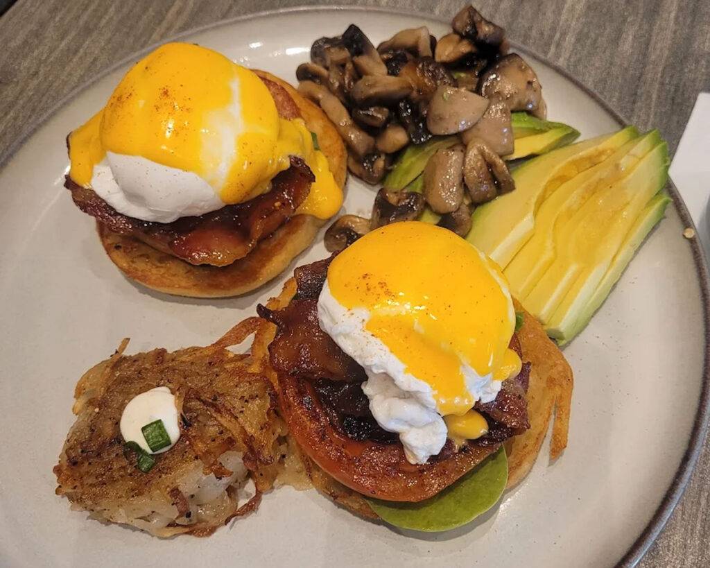 A beautifully plated café dish presented on a clean table setting, highlighting the café’s comforting yet refined food style, suitable for a casual yet elegant dining experience.