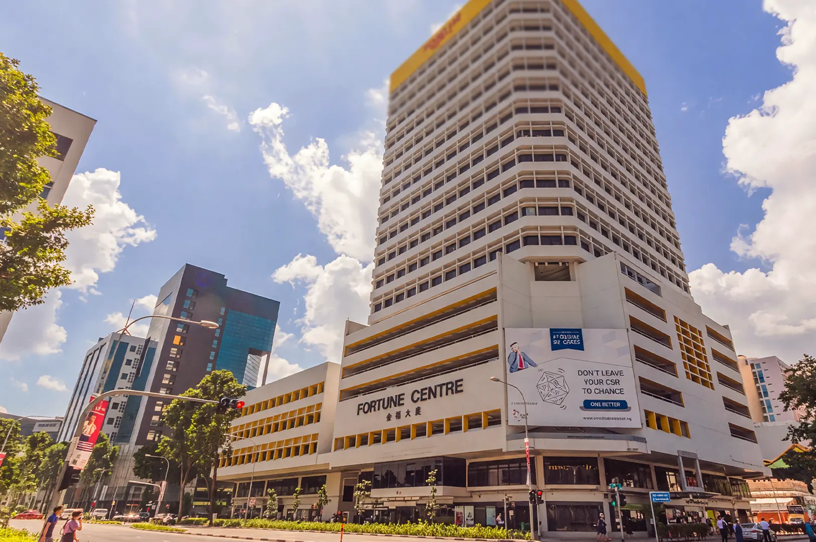 Exterior wide-angle view of the Fortune Centre building in Singapore, a popular destination for various cafes and hidden gem dining spots.