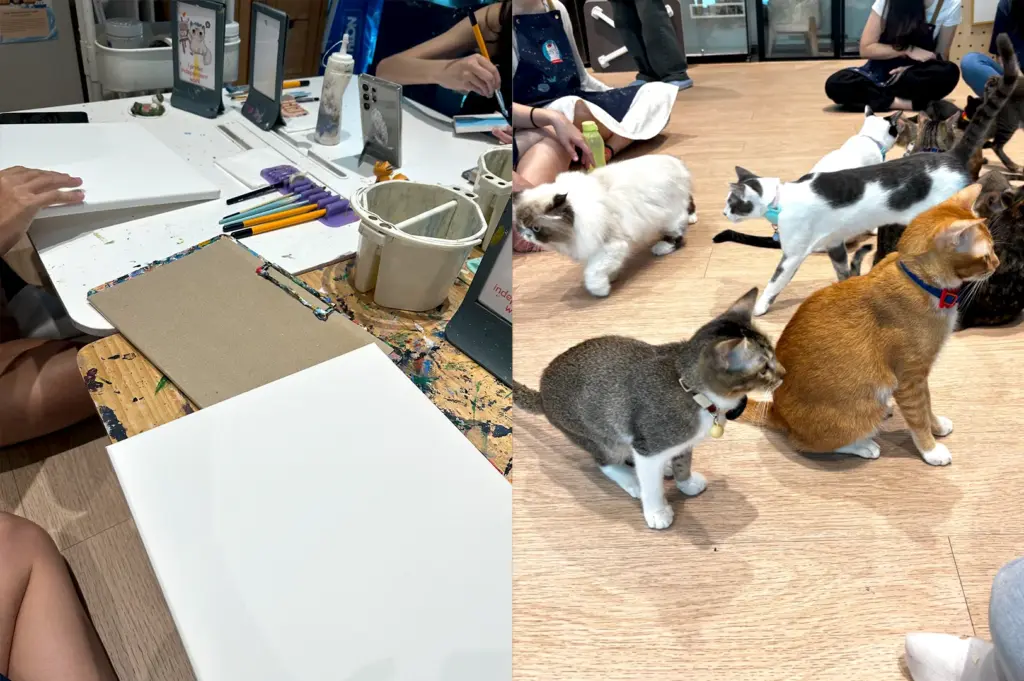 Guests participating in an art workshop at Wildflower Studio, a unique creative space where visitors can paint while spending time with resident cats.