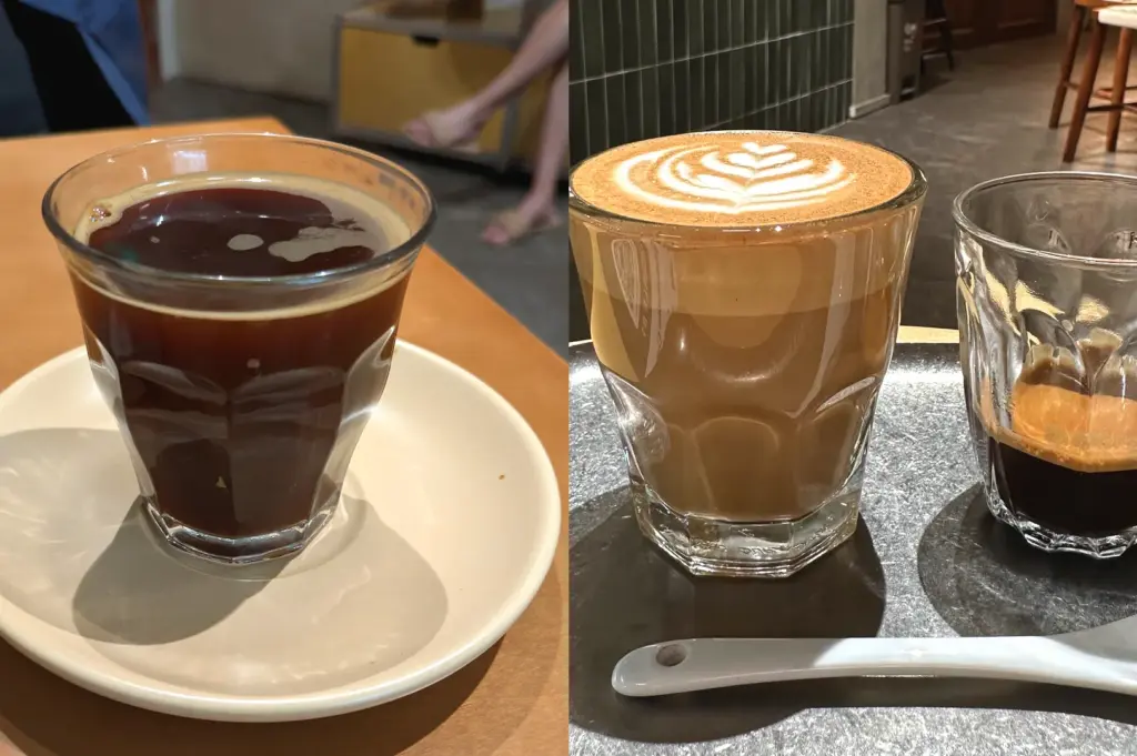 Close-up of freshly brewed filter coffee served at Kyuukei Coffee, featuring a detailed latte art design, highlighting the quality of artisan coffee in this popular Singapore café.