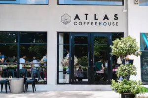 Atlas Coffeehouse logo above the main entrance.