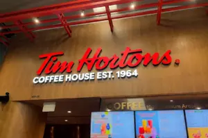 Tim Hortons close up view of their logo signage above the counter.